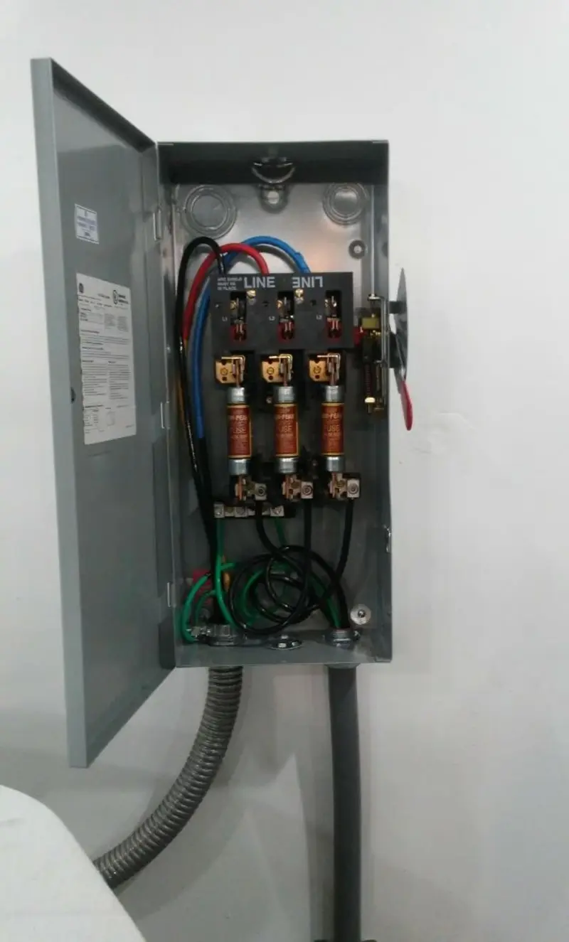 Three-phase disconnect switch installed for Smoke Detector Installation in Claryville
